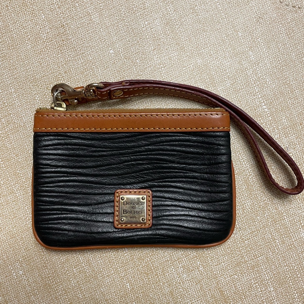 Dooney & Bourke Black and Tan Textured Wristlet with Red Interior